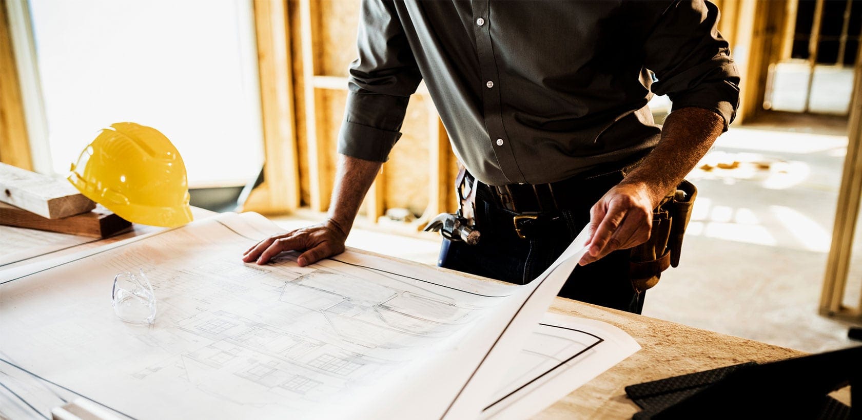 Engineer working on a blueprint