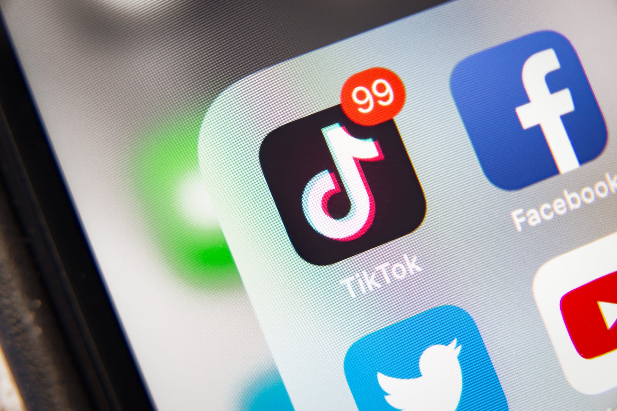 TikTok and Facebook app on mobile screen