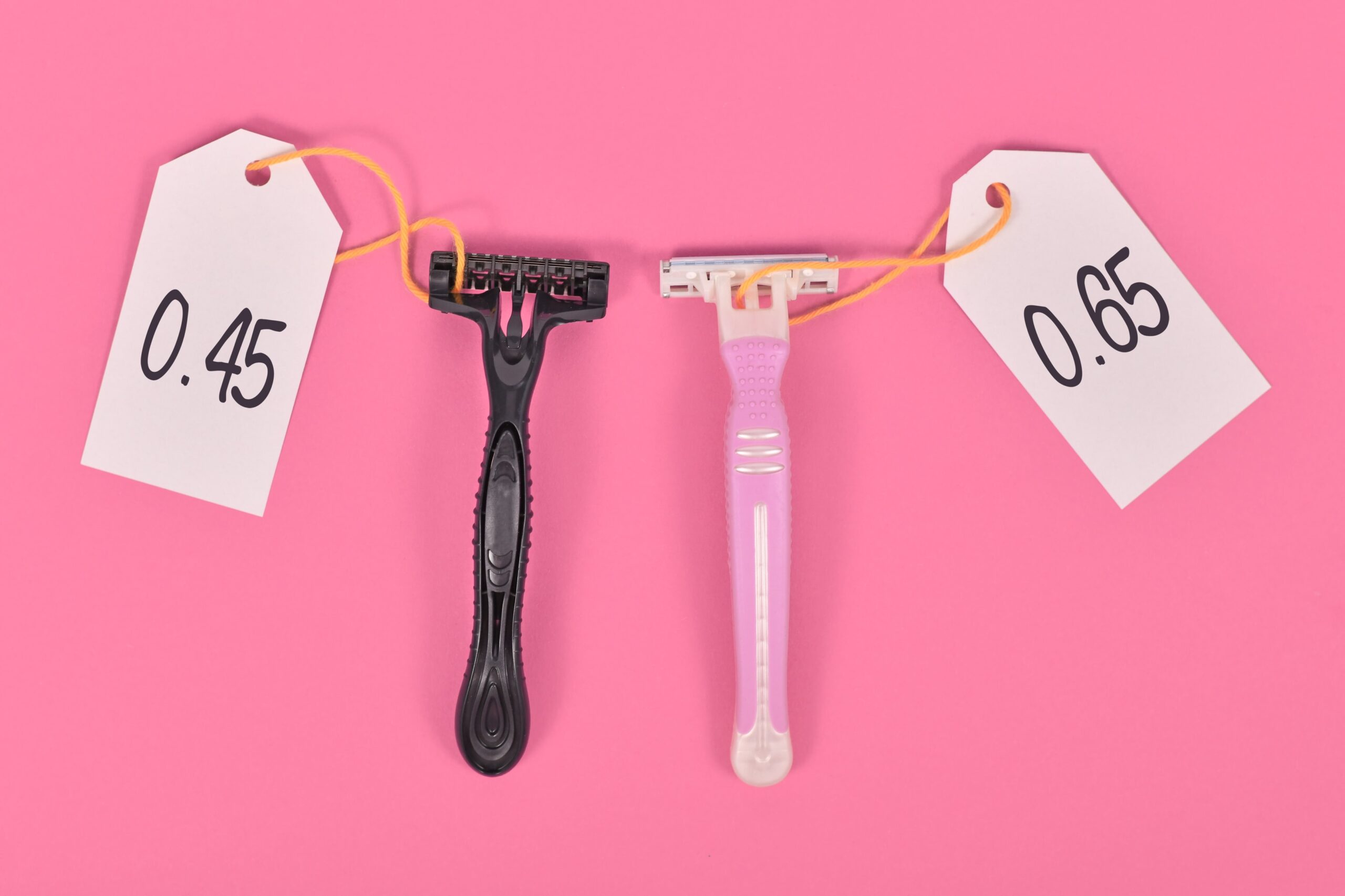 Concept for pink tax showing pink and black razor aimed at specific genders with different price tags.