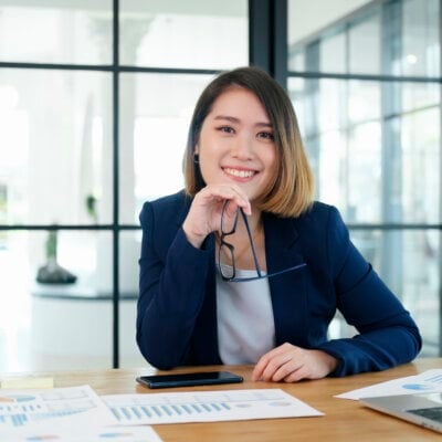 Confident asian businesswoman in office.