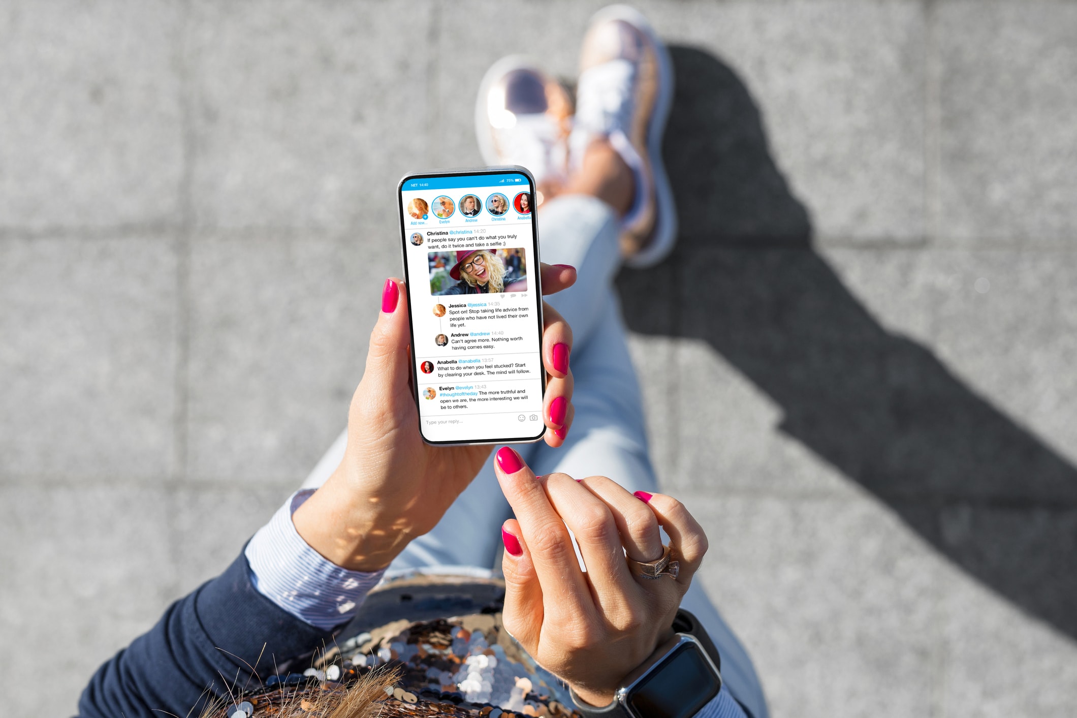 Woman using social media microblogging app on her smart phone.